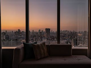 A View Of A City At Sunset