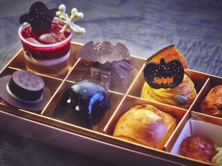 A Box Filled With Different Types Of Food On A Table