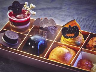 A Box Filled With Different Types Of Food On A Table