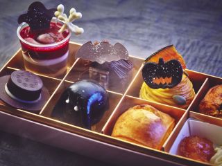 A Box Filled With Different Types Of Cake