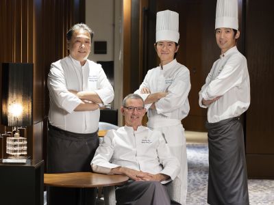 A Group Of People In Chef Outfits