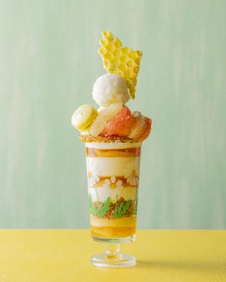 A Glass Of Ice Cream With A Scoop Of Ice Cream On Top